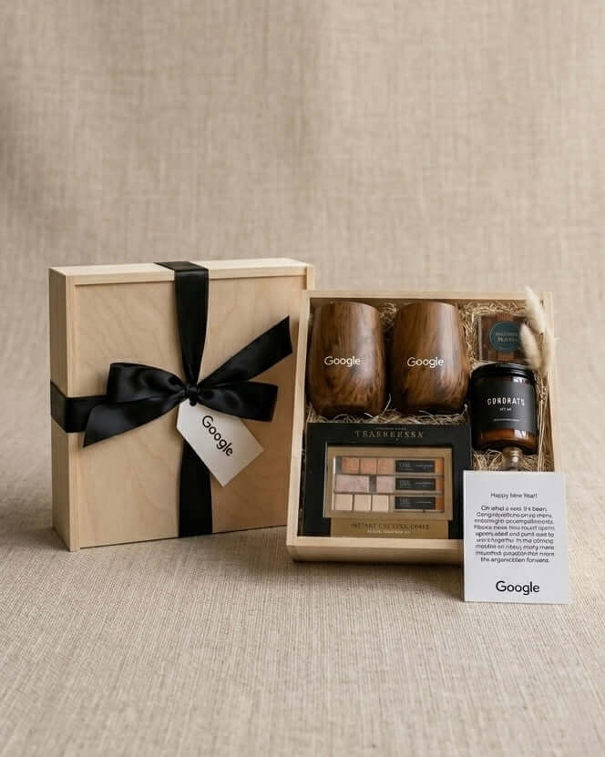 Luxury Corporate gifts Dubai & Business Gift Boxes featuring a wooden gift box with branded items from Google.