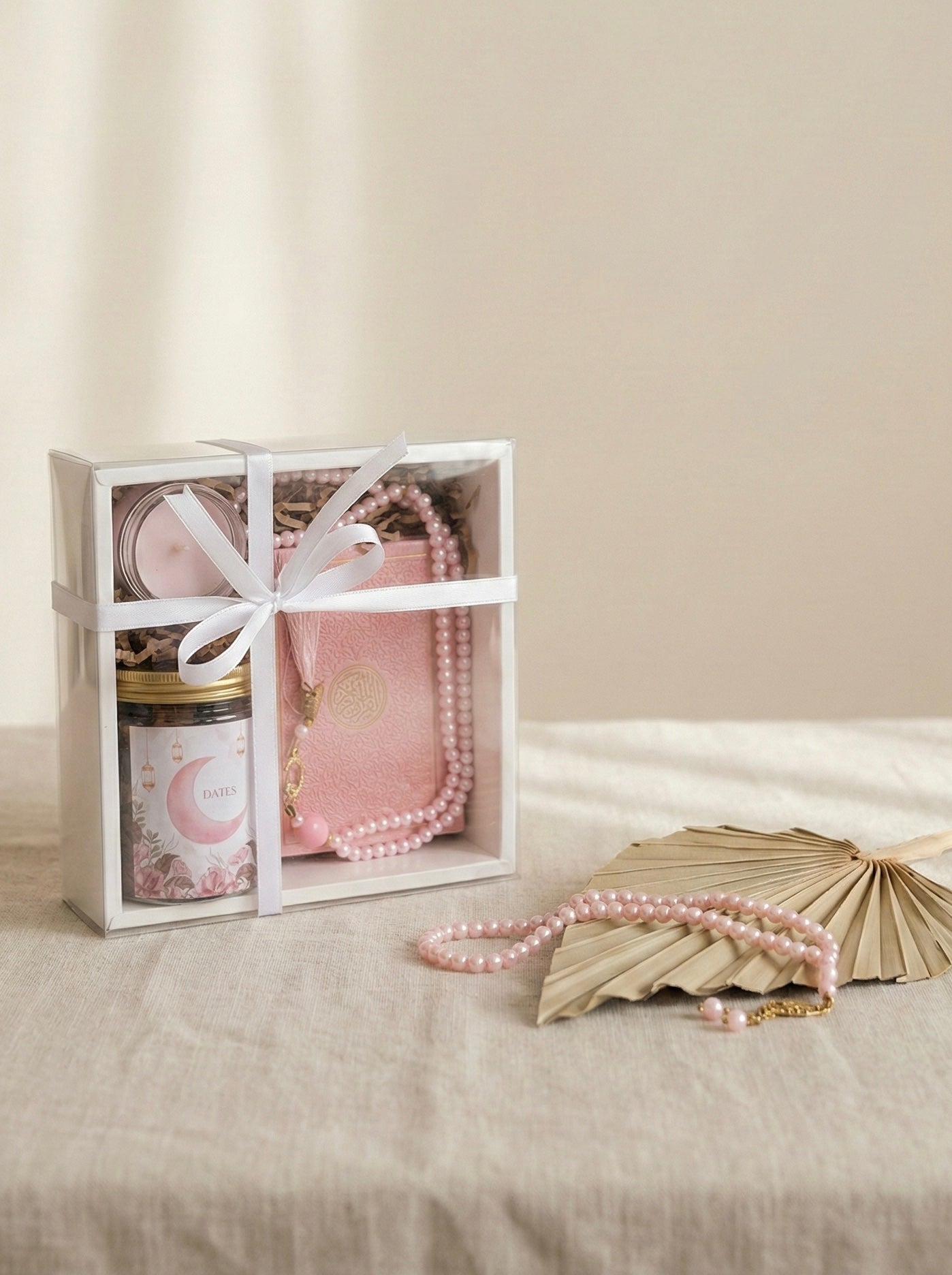 Dua Delights Box featuring premium dates, a candle, Quran, tasbih, and card - Ramadan gift box UAE.