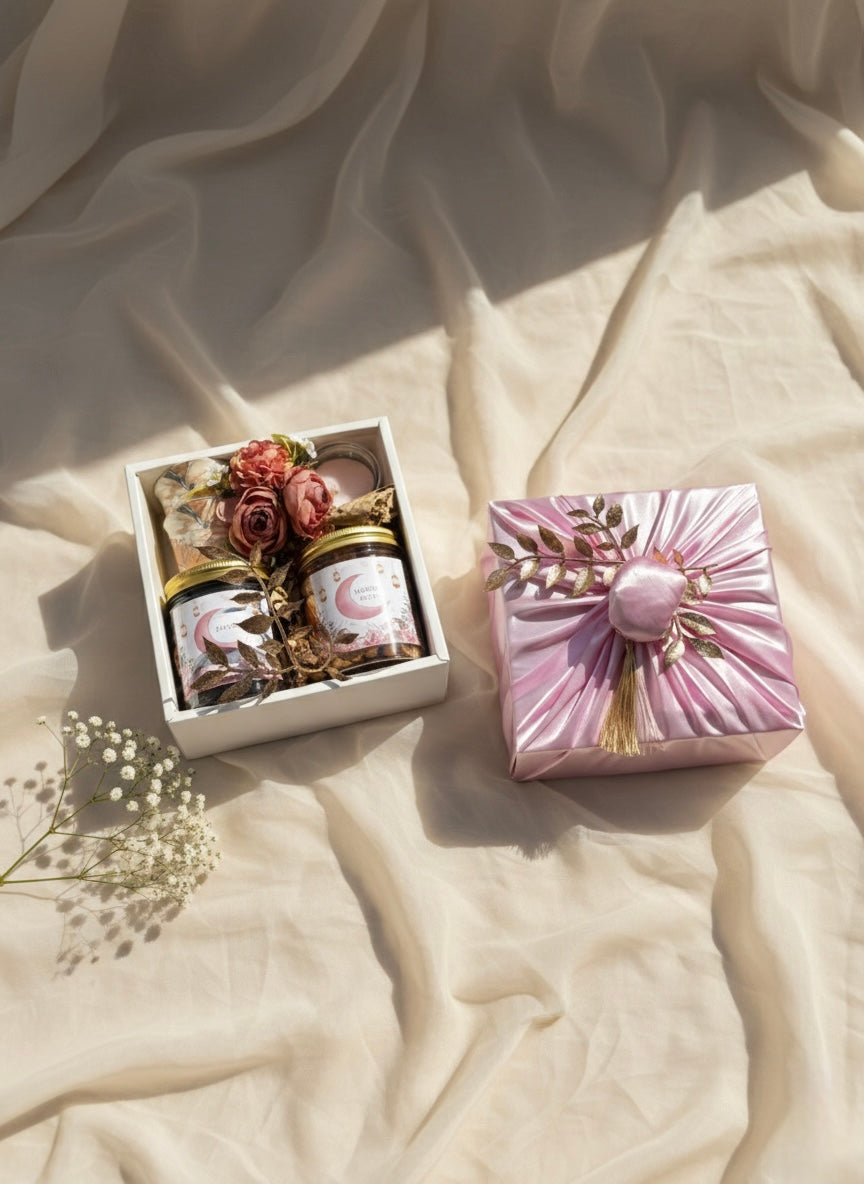 Furoshiki Noor Box with jar of dates, mixed nuts, kahwa cups, and mini candle - an Eid gift hampers UAE.