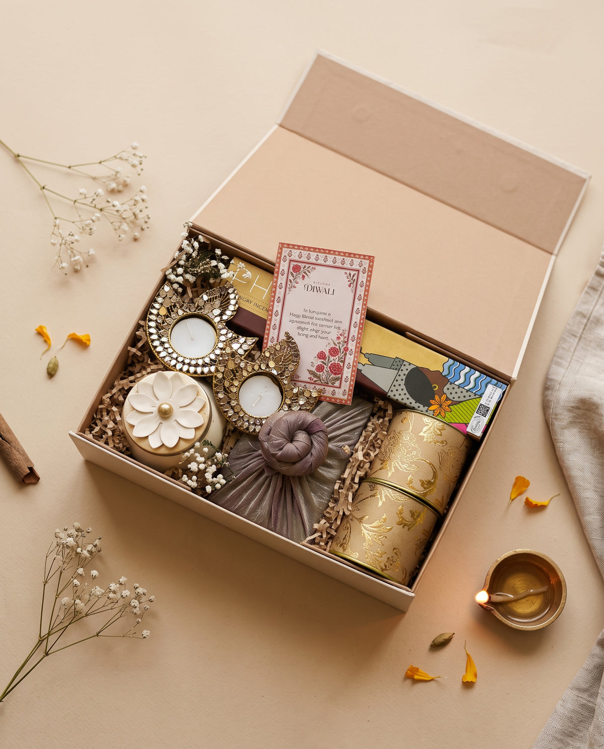 Utsav Gold Hamper featuring diyas, incense sticks, and festive decorations for Diwali in UAE.