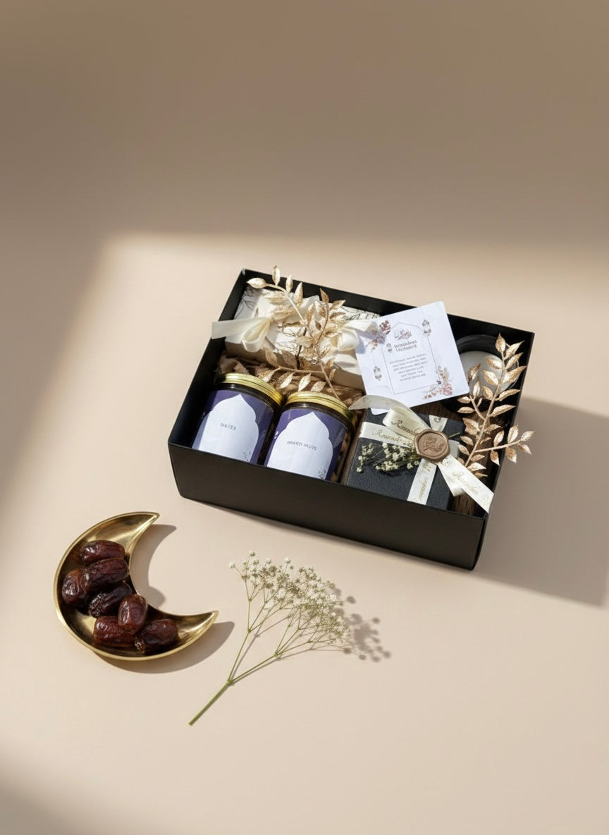Minimal Moon Box gift set featuring jars of dates, mixed nuts, premium coffee pods, chocolates, and a candle.