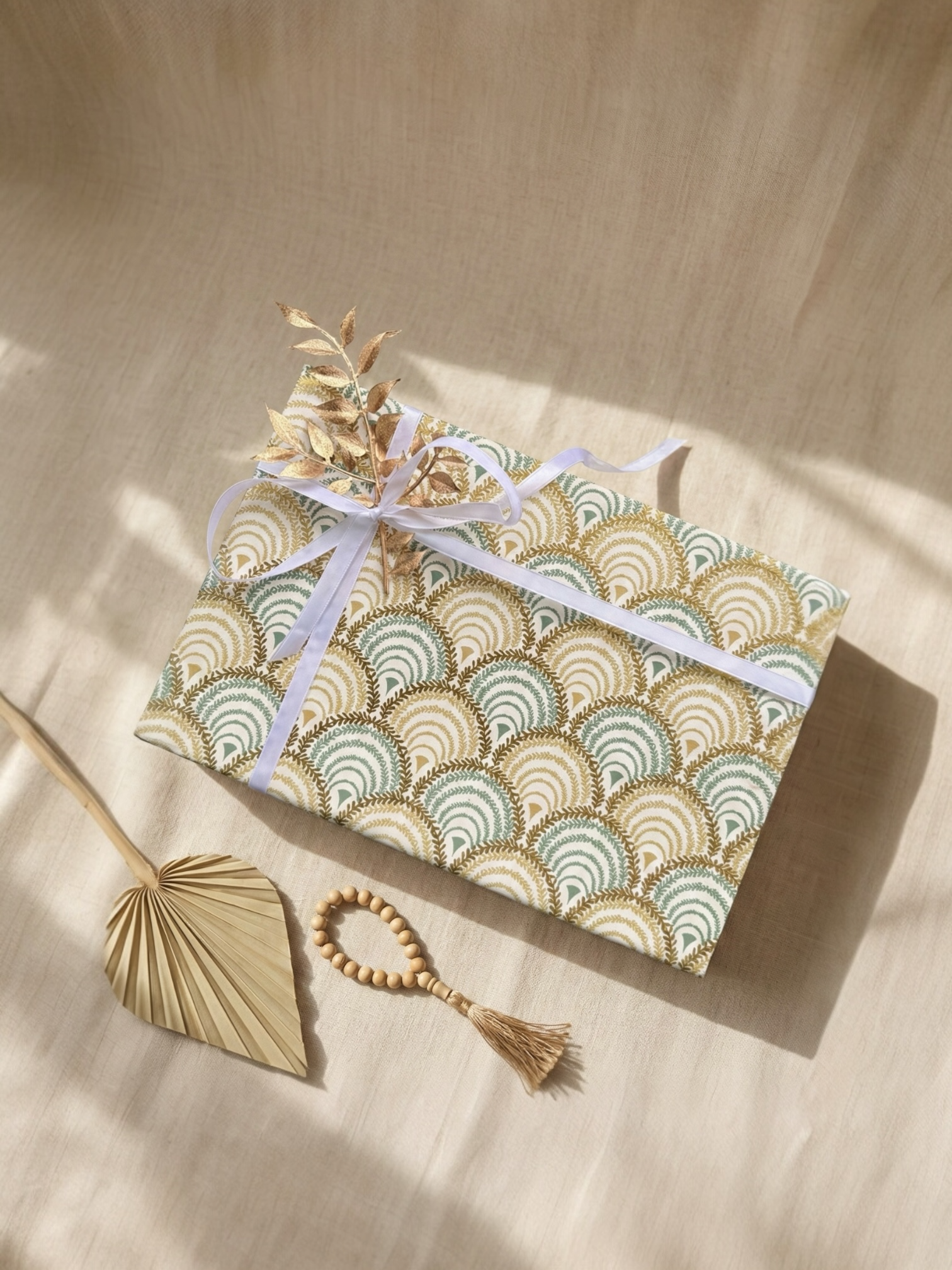 Beautifully wrapped Gardens of Grace Box, showcasing executive Ramadan hampers with intricate design and decorative accents.