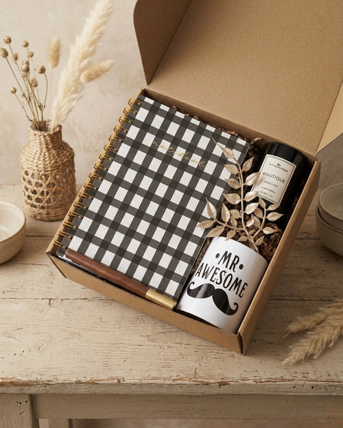 Mr. Awesome gift box for him UAE with spiral notebook, gold pen, scented candle, and mug in eco-friendly kraft box.