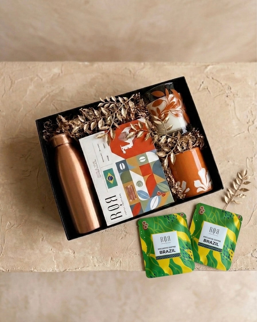 The Copper & Cacao Gift Box featuring a handcrafted copper bottle and artisanal Brazil coffee drips.