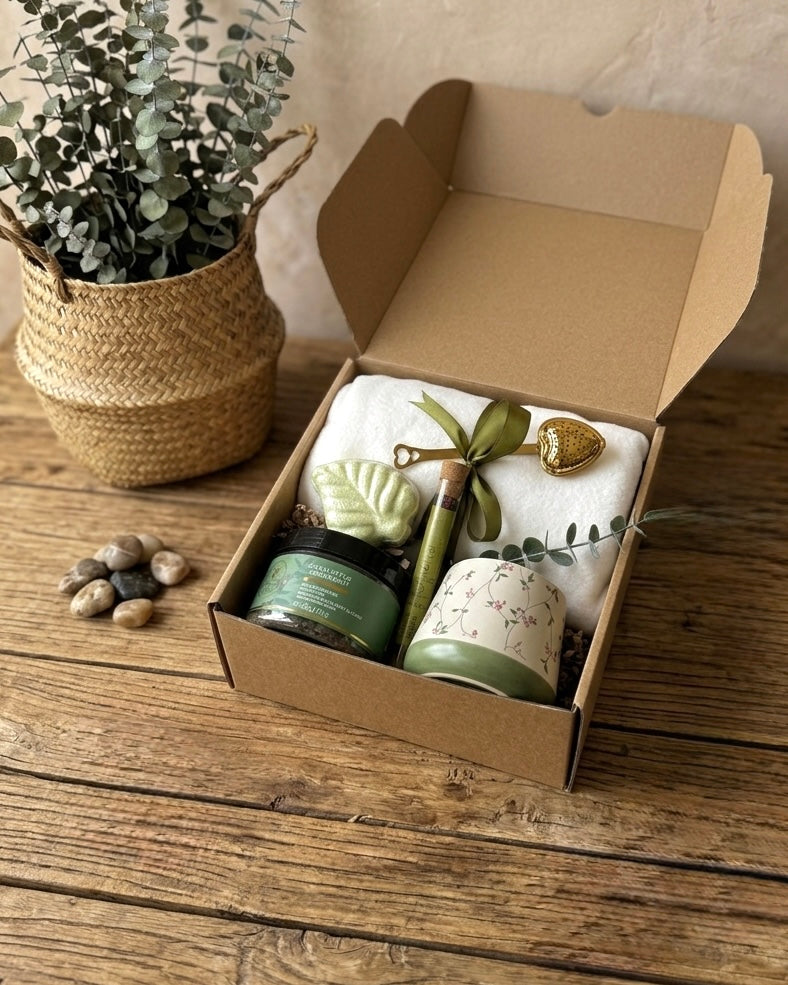 forest ritual gift box featuring a botanical scrub, bath bomb, and a luxurious throw blanket.