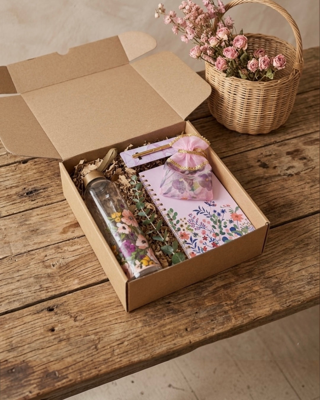 The Refresh & Revive Box, a botanical gift box for women, featuring floral items in eco-friendly packaging.