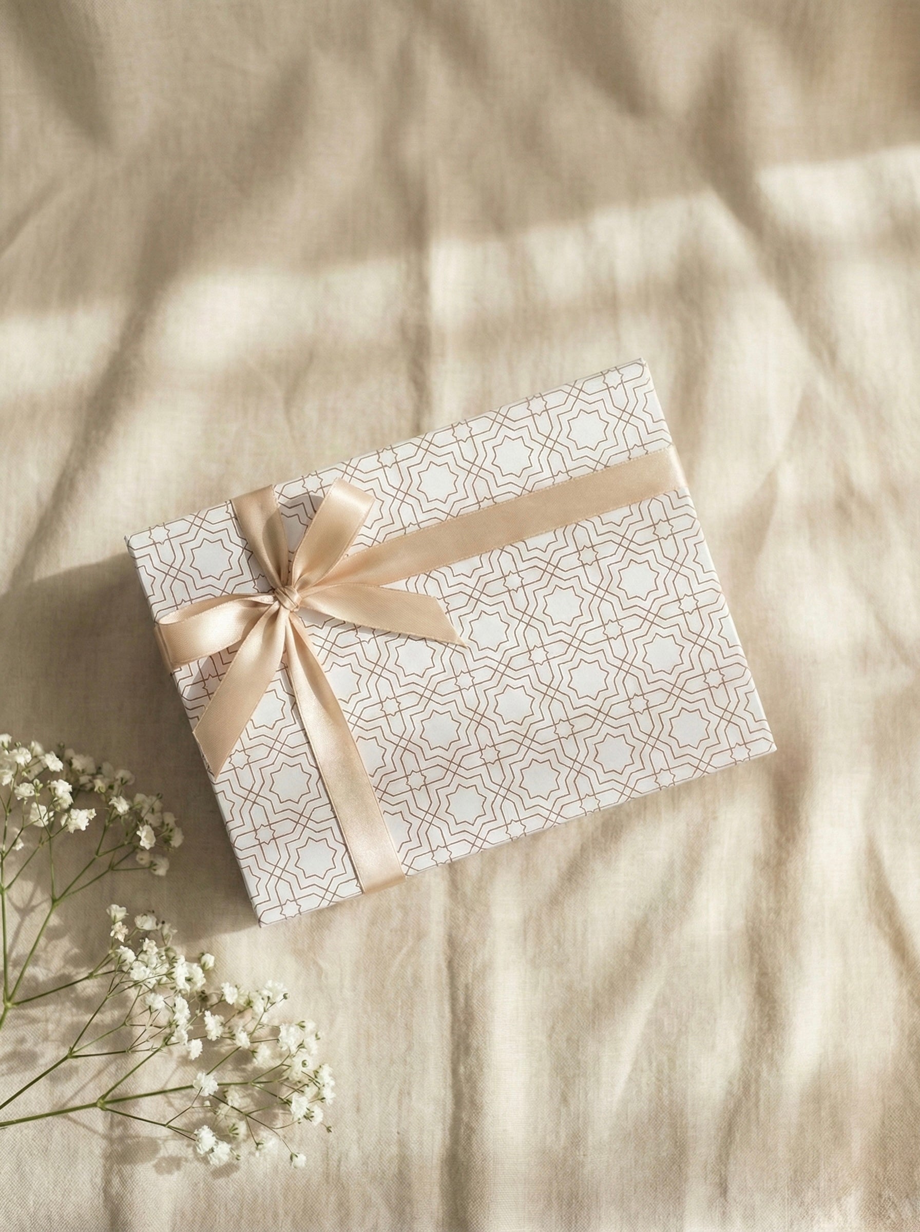 Beautifully wrapped gift box with bow, perfect for corporate Ramadan gifts Dubai.