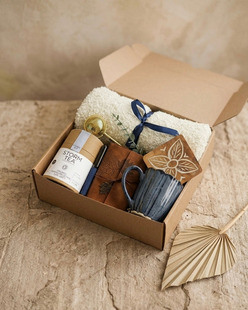 The Slow Morning Box featuring premium organic Earl Grey tea, mindful tea gift set UAE, and accessories in kraft packaging.