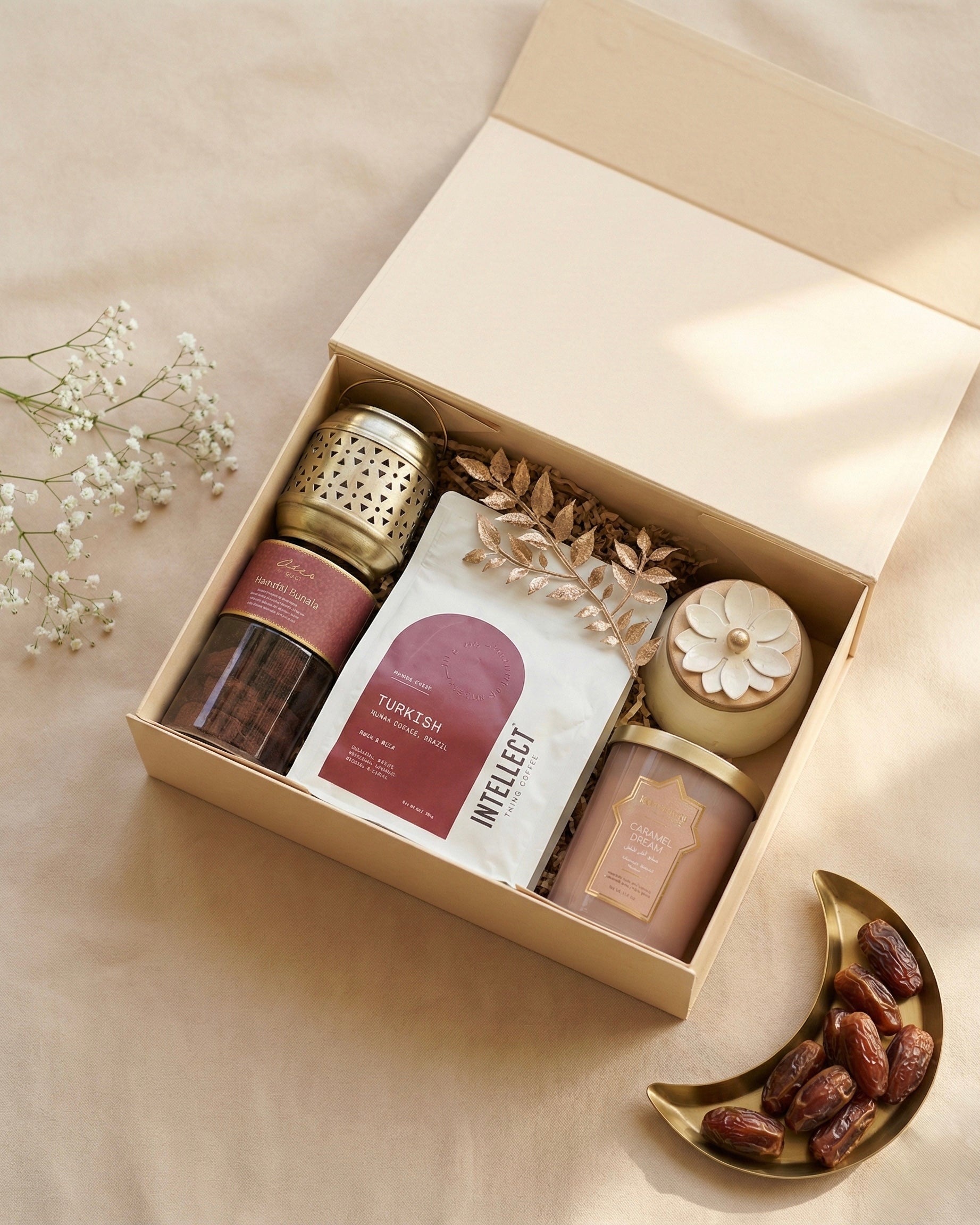 Turkish coffee gift set in a decorative box with scented candle, coffee, dates, and lantern.