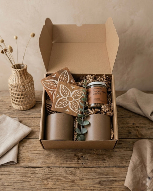 Warm Earth Gift Box: eco friendly gift box for her with ceramic mugs, wooden coasters, and a candle.